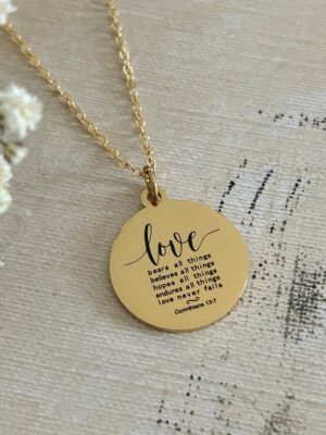 love never fails necklace